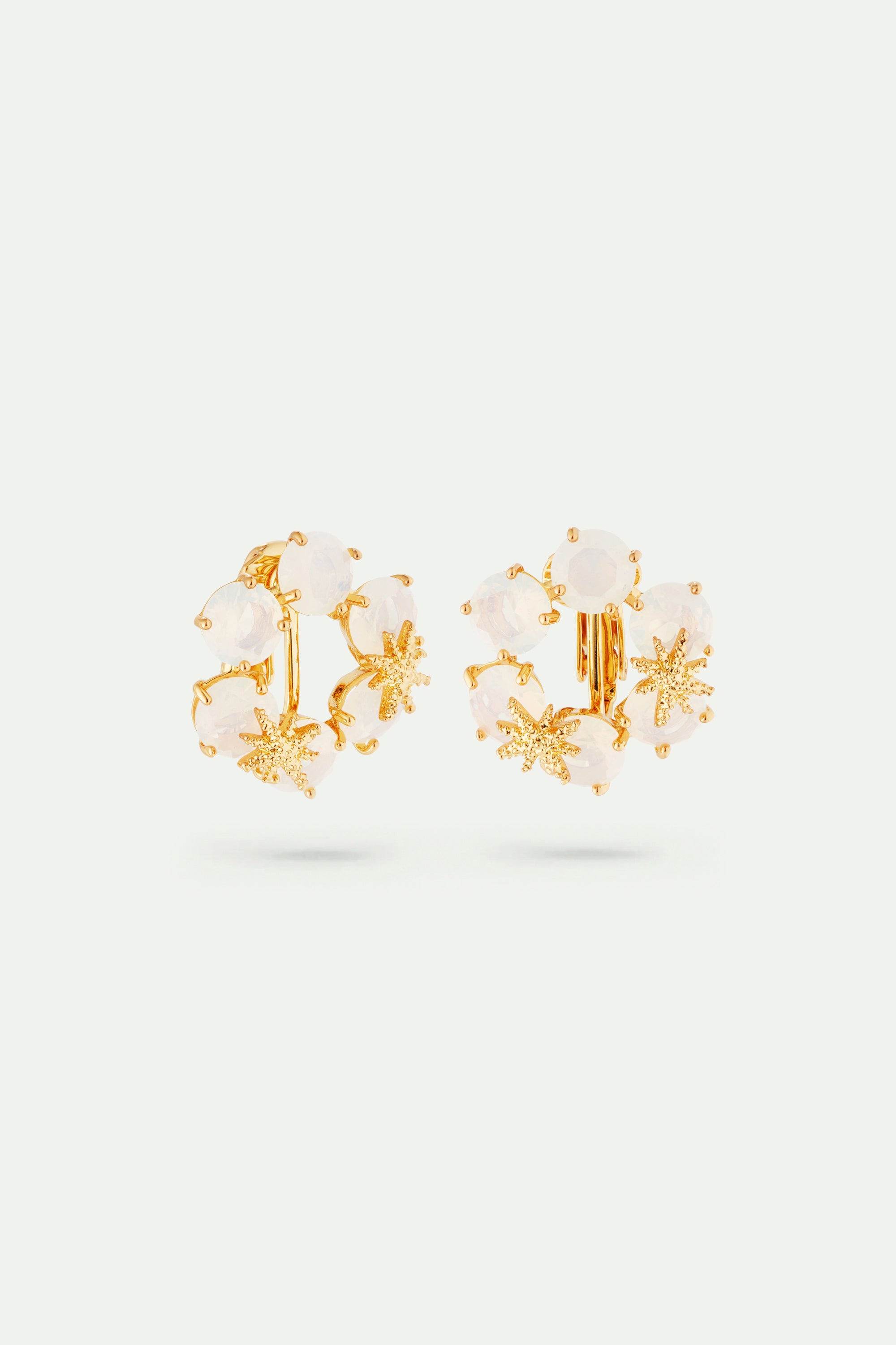 Opalescent white Diamantine six stone earrings with fine stars