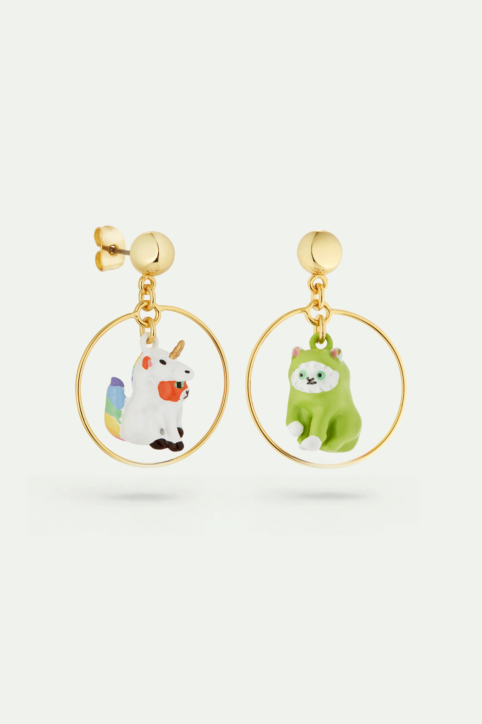 Asymmetrical unicorn and dinosaur earrings