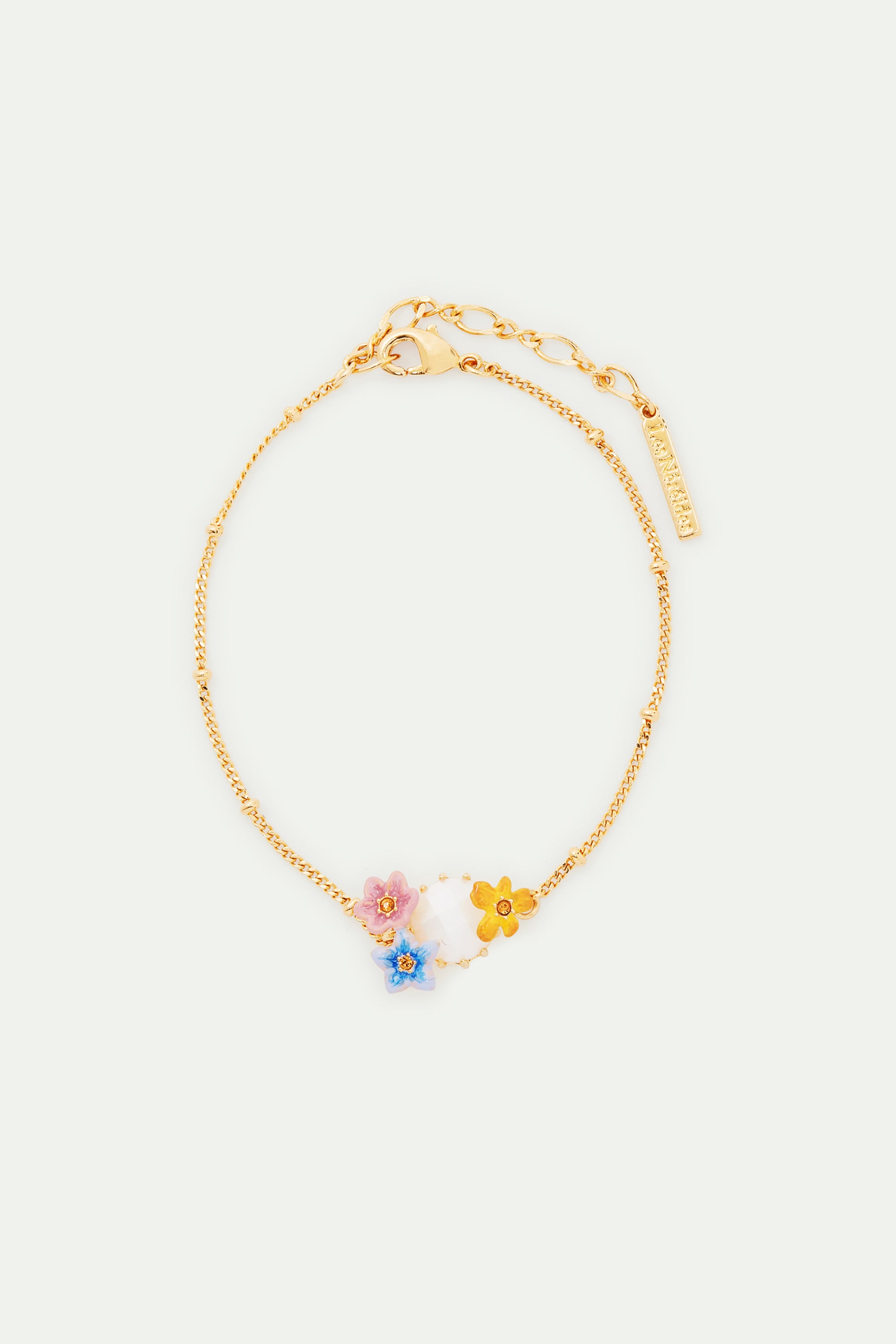 Pulsera fina de cristal facetado y 3 flores de jazmín de colores.