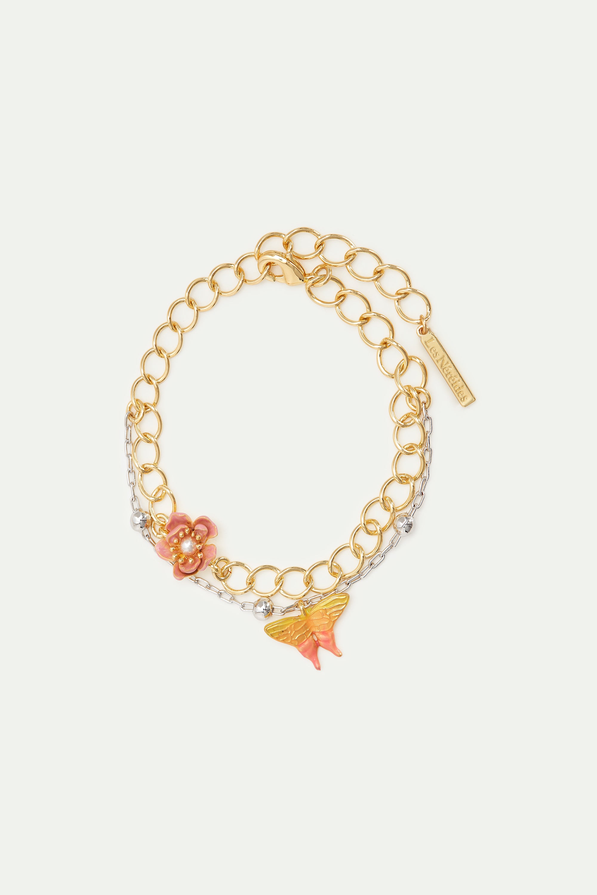 Pulsera doble cadena bicolor, flor de magnolia y mariposa