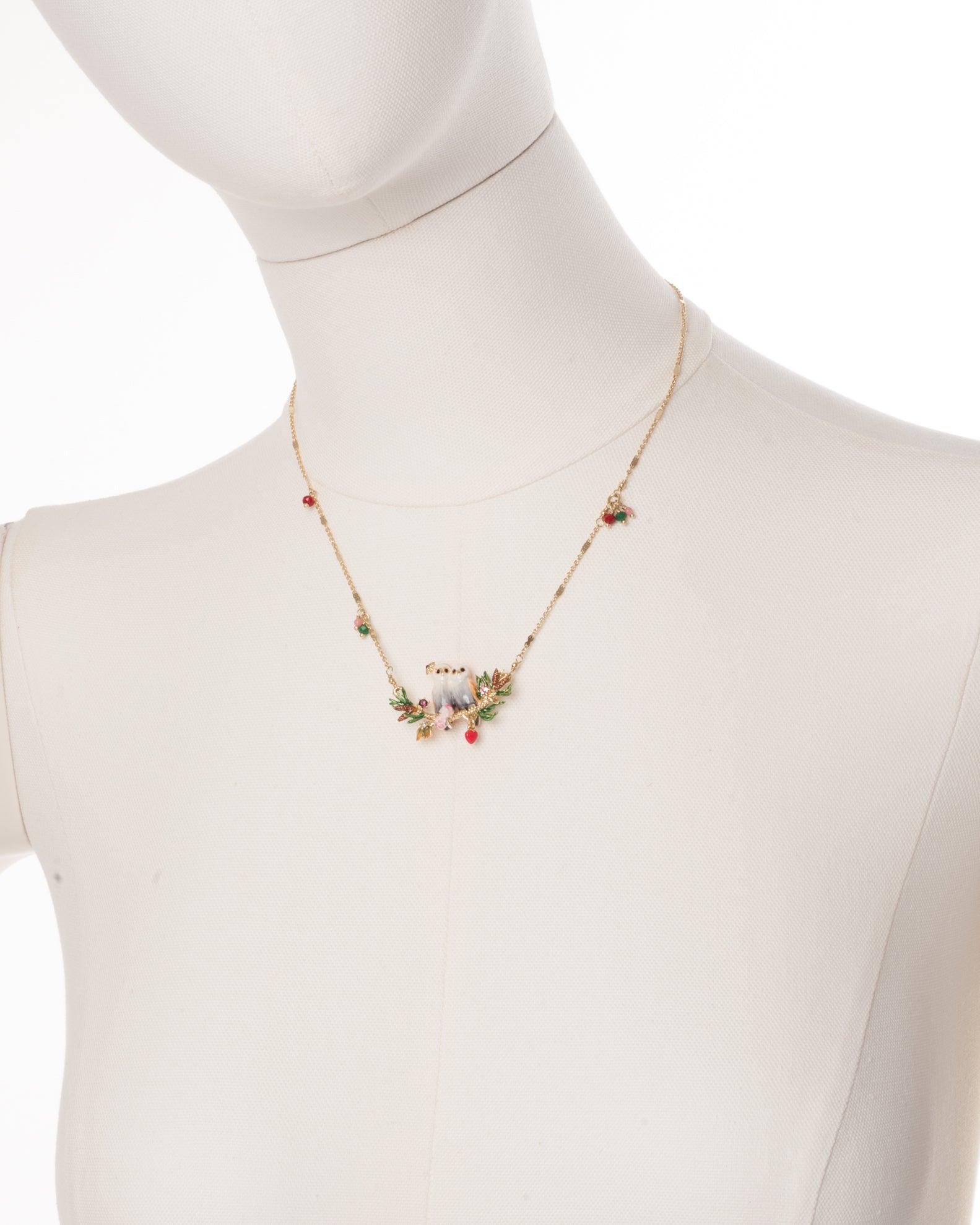 Collier plastron hiboux, coeur et verre faceté