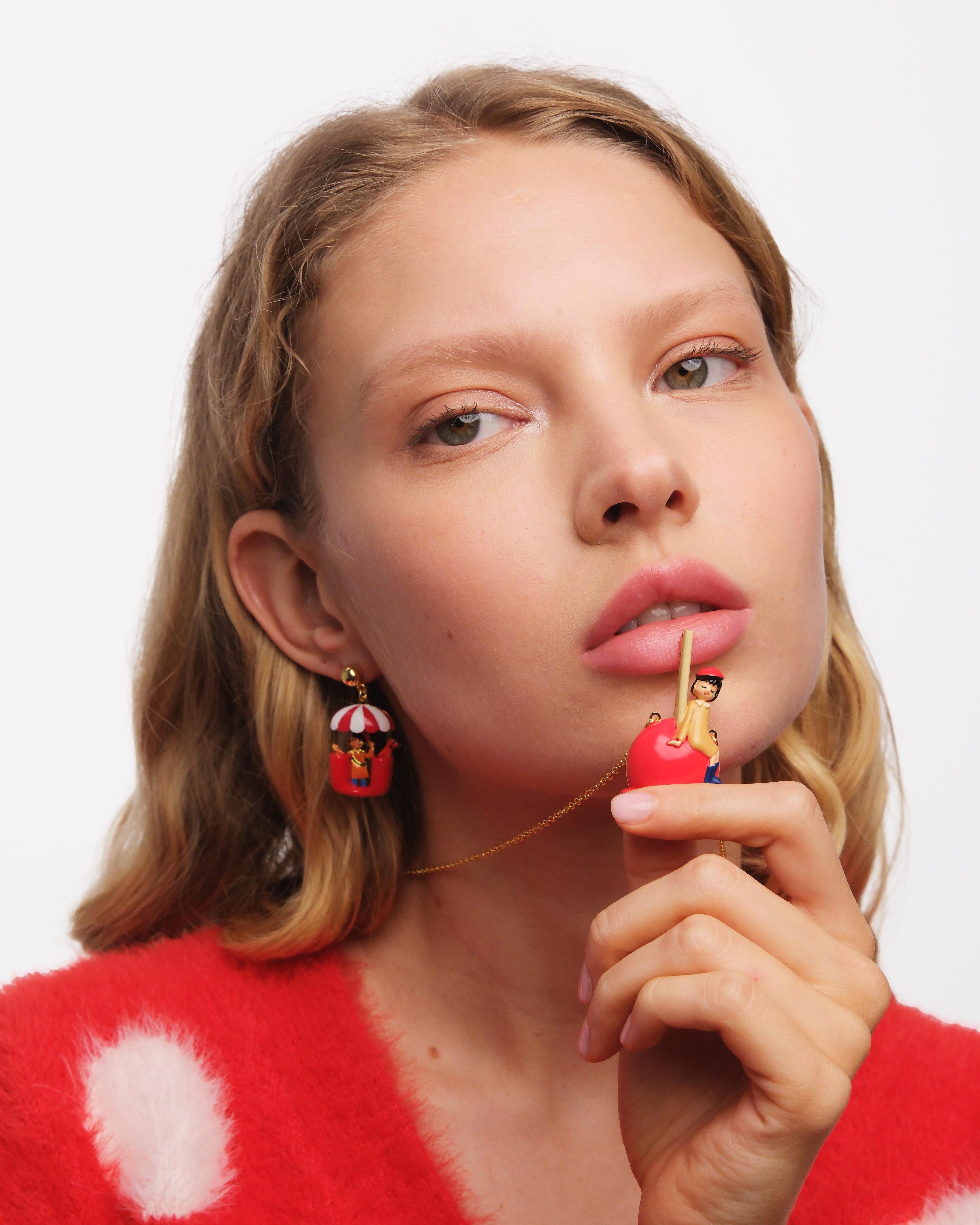 Little girl on a candy apple pendant necklace