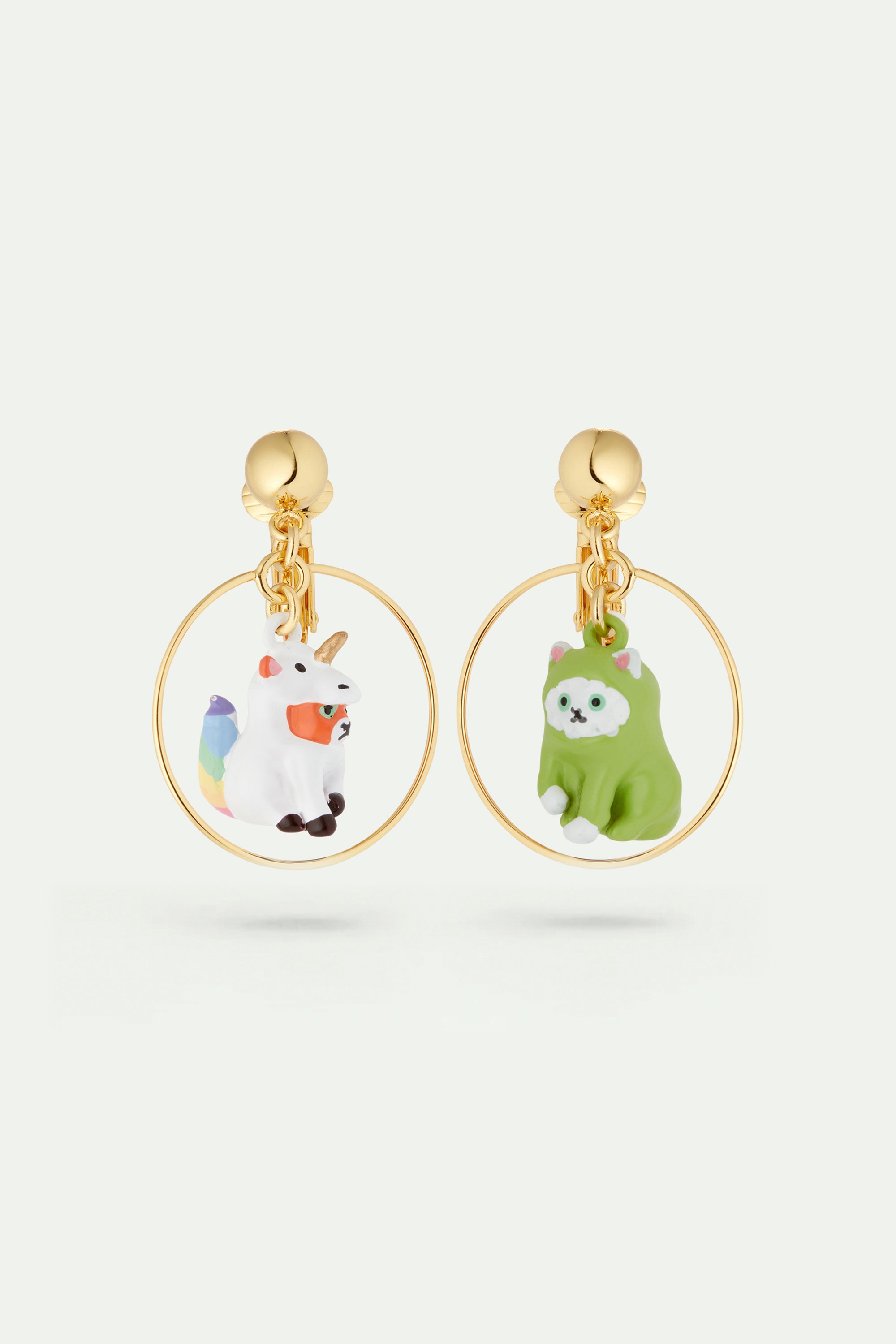 Asymmetrical unicorn and dinosaur earrings