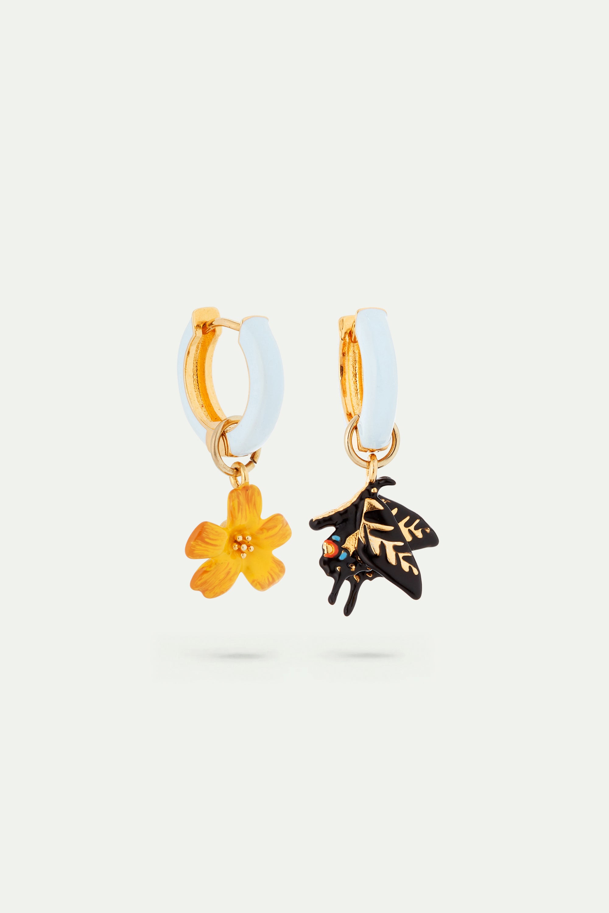 Asymmetrical butterfly and jasmine flower post earrings