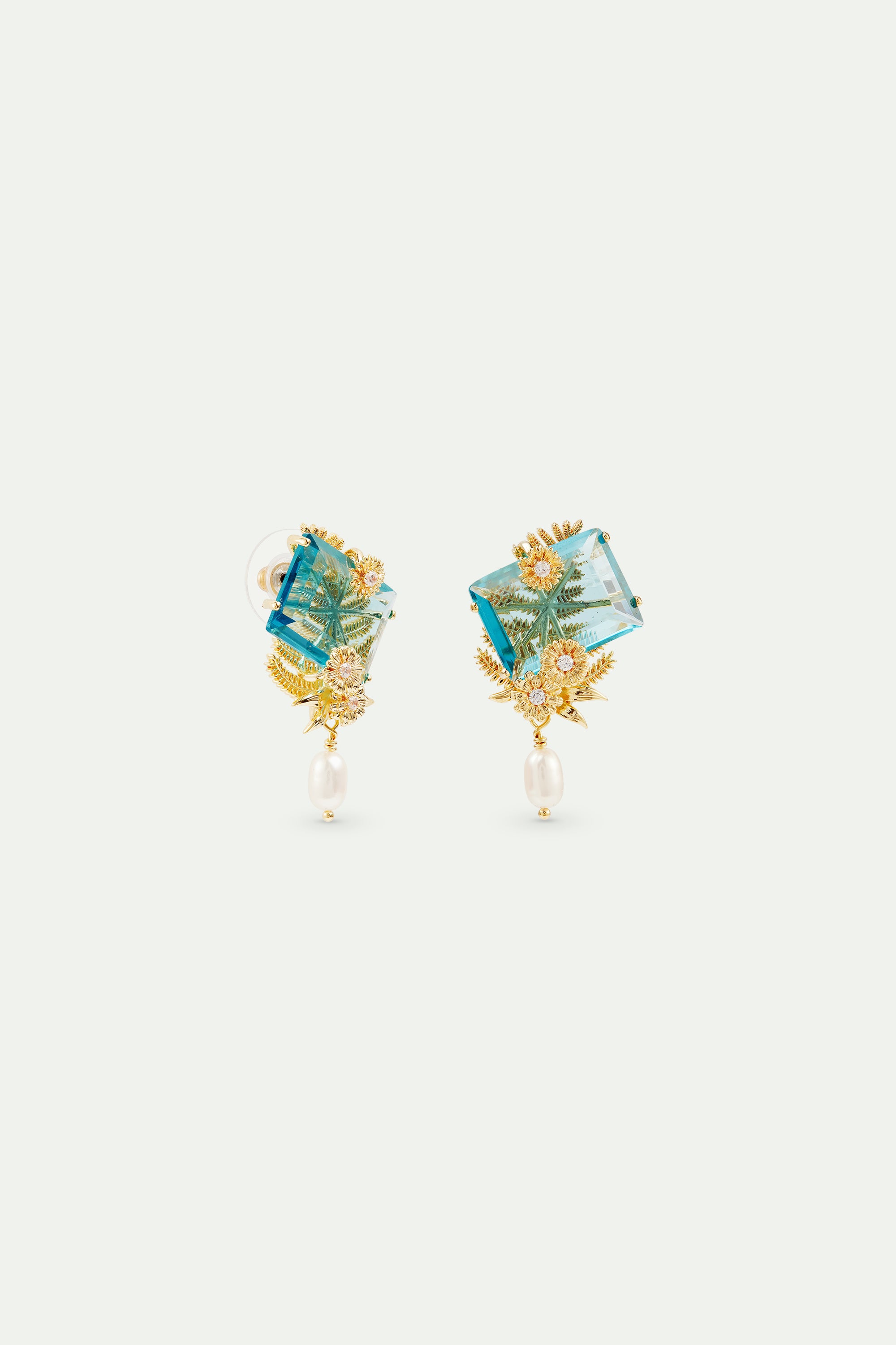 Post earrings with blue cut stone, golden flowers and cultured pearl