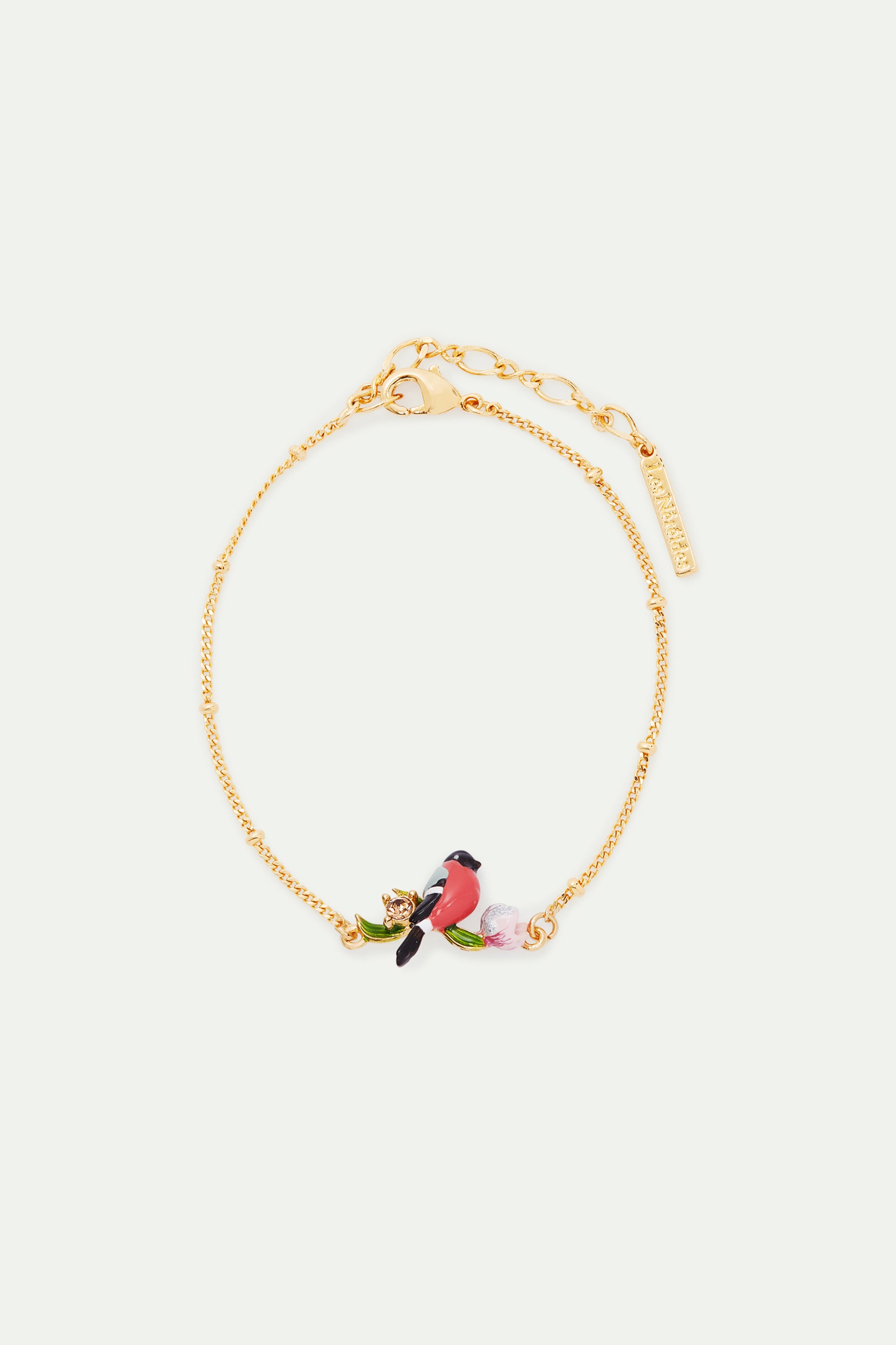 Pulsera fina pájaro y flor de eléboro