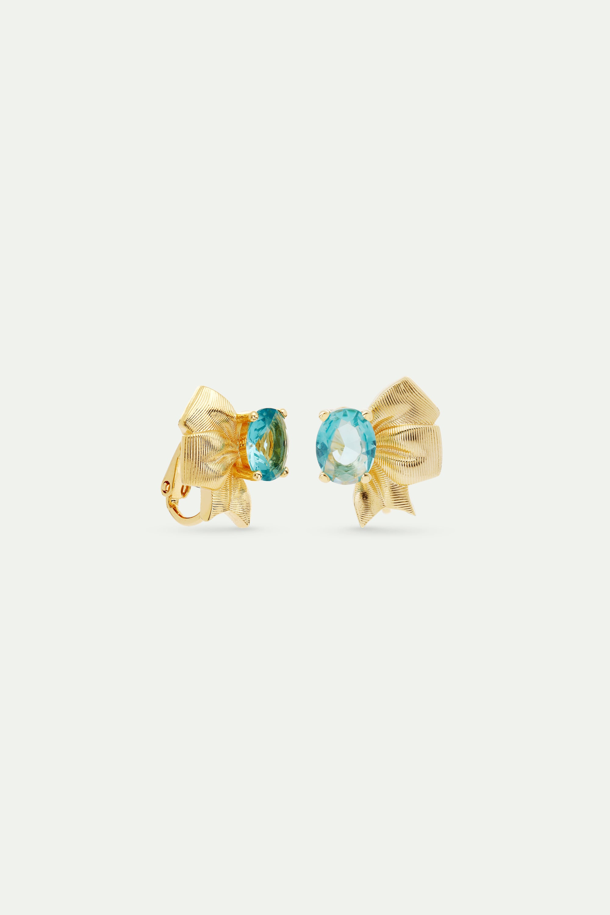 Gold ribbon and blue cut stone earrings