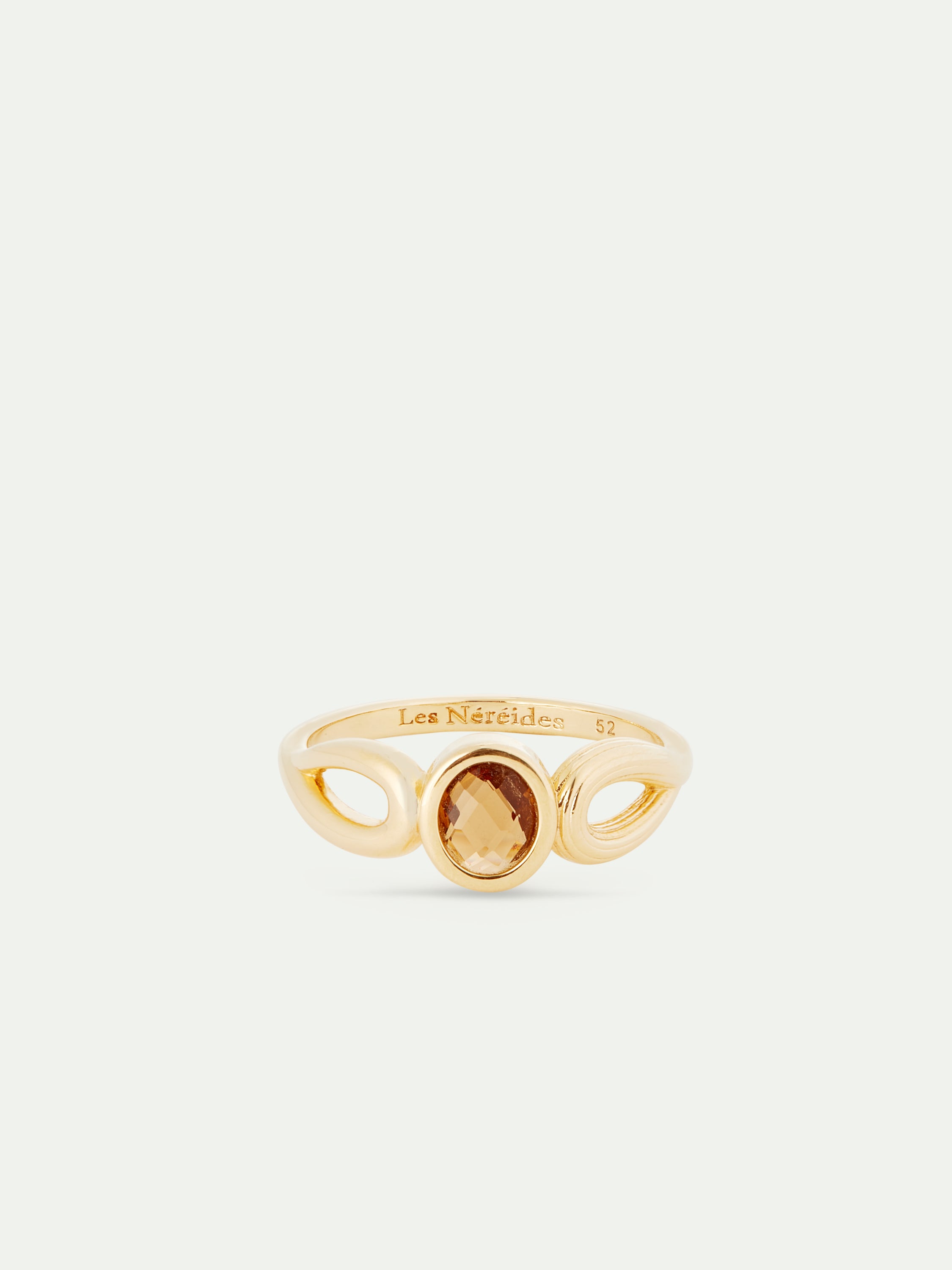 Thin gold ring, striated texture and faceted glass