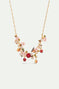 Collier plastron pomme, rouge-gorge et fleurs de pommier