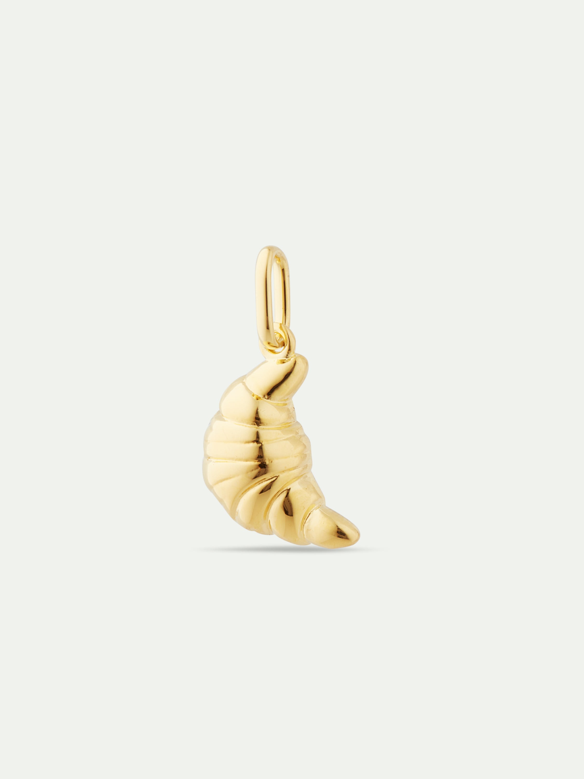 Golden croissant pendant: Pleasure and Refinement