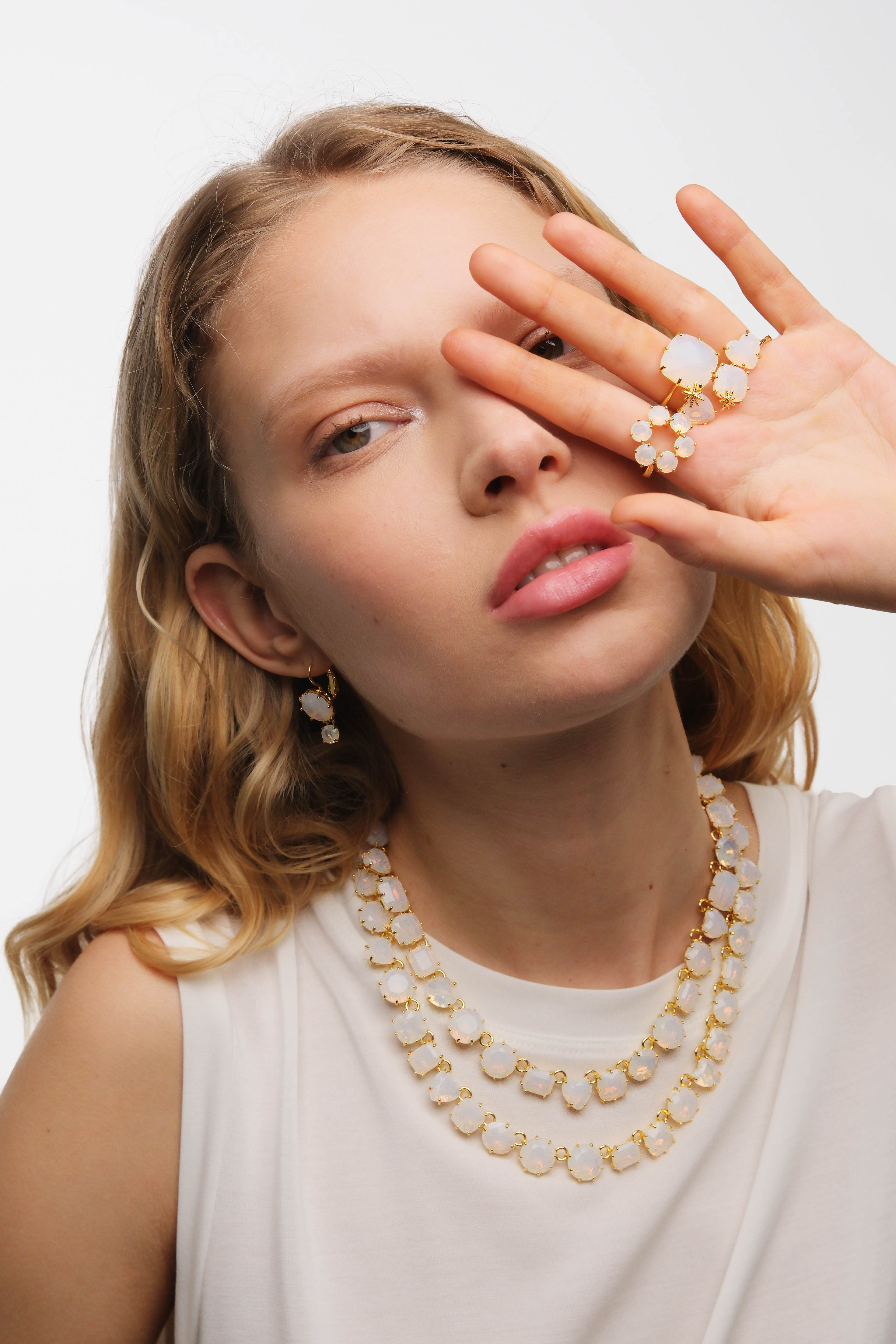 Opalescent white Diamantine fine ring with six round stones