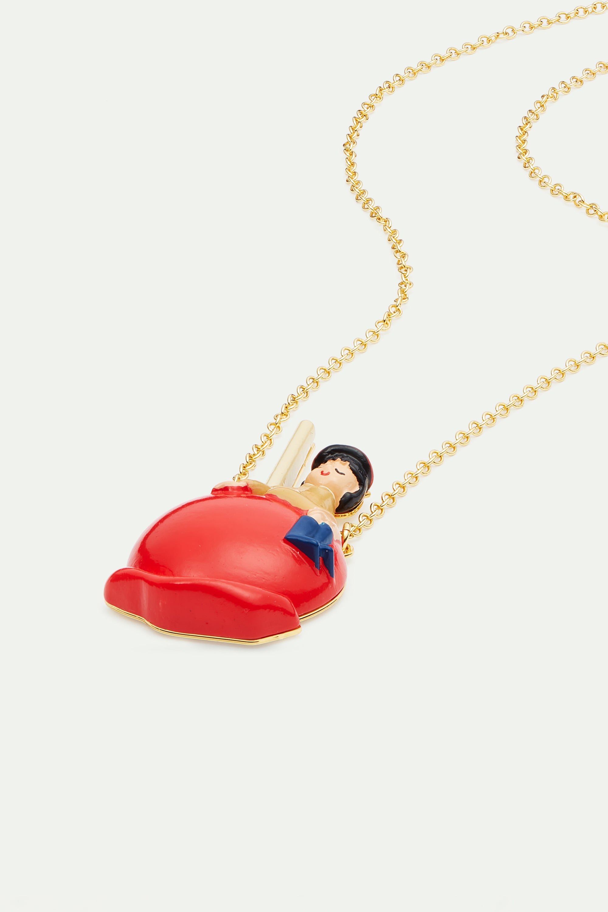 Little girl on a candy apple pendant necklace