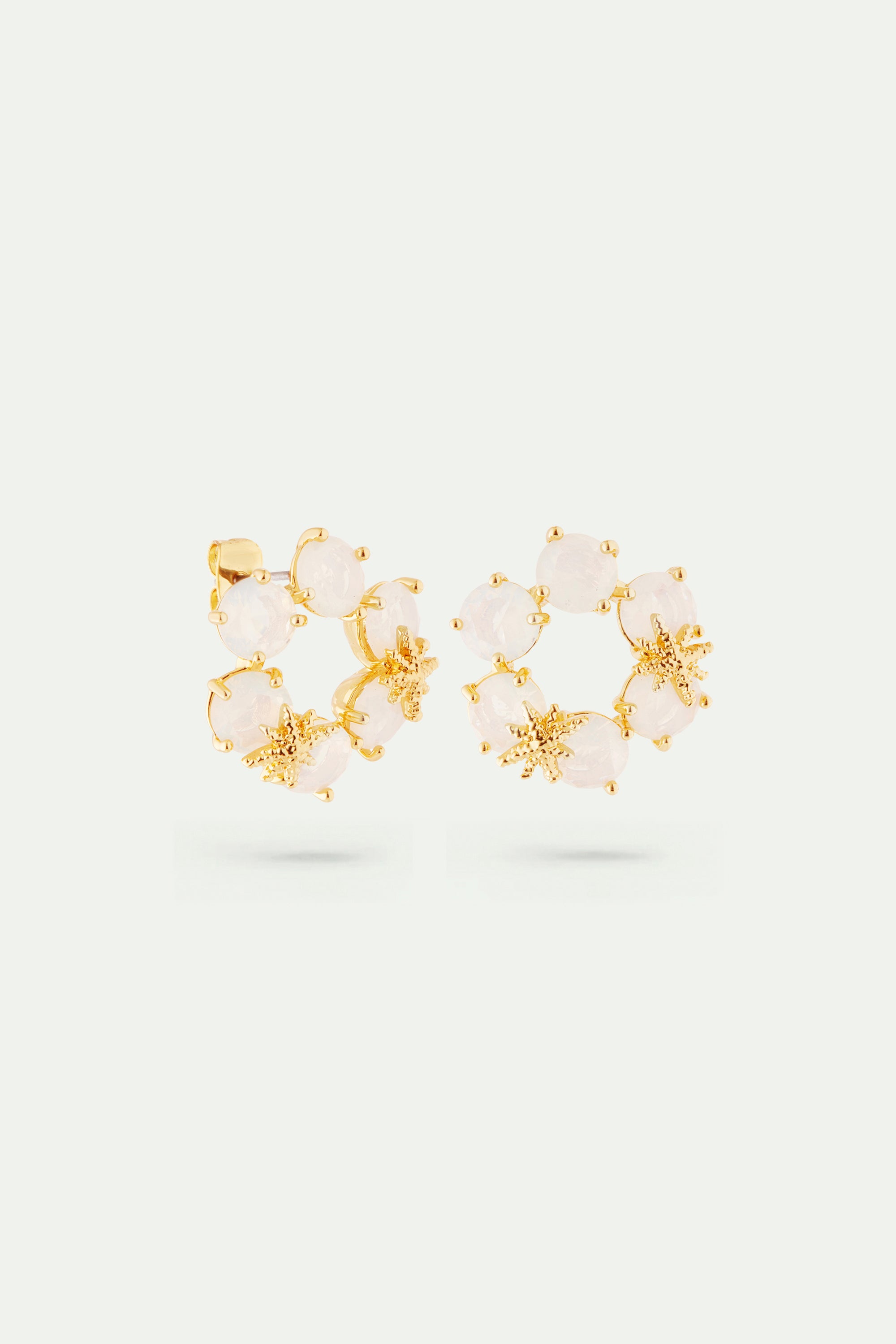 Opalescent white Diamantine six stone earrings with fine stars